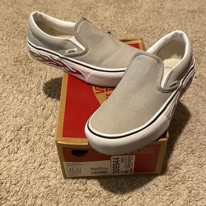 Grey platform vans with flames